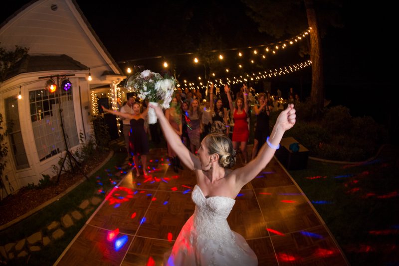 A bride is ready for the bouquet toss at her private home in Placerville, California